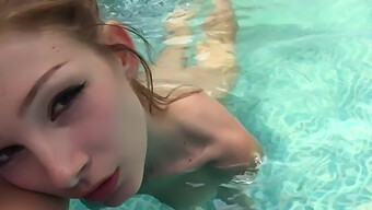 Close-Up Of A Girl Pleasuring Herself In The Pool